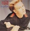 ouvir online Jason Donovan - Hang On To Your Love